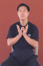Master Li Holding the Lotus